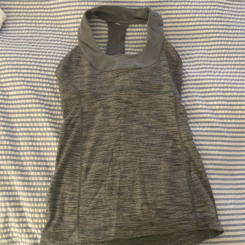 Lululemon fitted tank top that includes bra and cups.